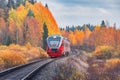 Passenger diesel local train moves to Sortavala at autumn day time. Karelia. Royalty Free Stock Photo