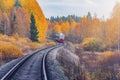 Passenger diesel local train moves to Sortavala at autumn day time. Karelia Royalty Free Stock Photo