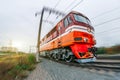 Passenger diesel train traveling speed railway wagons journey light.