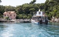 Passenger ferry and boarding tourists on Lokrum Island Croatia Royalty Free Stock Photo