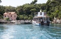 Passenger ferry and boarding tourists on Lokrum Island Croatia