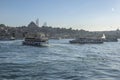 Passenger ferry boats cross Golden Horn at Karakoy in Istanbul in Turkey. Royalty Free Stock Photo