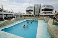 PASSENGER FERRY, MIDSEA, SPAIN - JUNE 09, 2012: Passengers enjoy at swimming pool on upper deck of The luxury cruise MSC SPLENDIDA Royalty Free Stock Photo