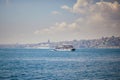 Passenger ferry sails across Bosphorus strait in Istanbul, Turkey Royalty Free Stock Photo