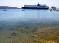 A passenger ferry stands in the port of the resort town of Marmari on the Greek island of Evia in Greece