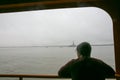 passenger on the ferry to Staten Island observing the view Royalty Free Stock Photo