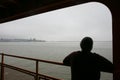 passenger on the ferry to Staten Island observing the view Royalty Free Stock Photo