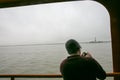 passenger on the ferry to Staten Island observing the view Royalty Free Stock Photo