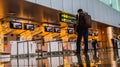 Passenger in front of check-in counter desk