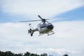 Passenger helicopter flies at an air show