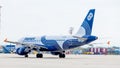 Passenger jet aircraft Airbus A319 of Aurora Airlines on airfield. Aviation and transportation