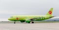 Passenger jet aircraft Airbus A320 of S7 Airlines on airfield. Aviation and transportation