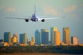 Passenger jet airliner plane arriving or departing Tampa International Airport in Florida at sunset or sunrise