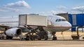 Passenger jet airplane docked on airport gate Royalty Free Stock Photo