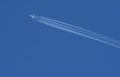 Passenger jet with contrails