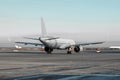 A passenger jet plane run the follow-me-car along the airport apron Royalty Free Stock Photo