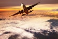 Passenger jet plane take off to mid air against beautiful golden Royalty Free Stock Photo