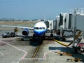 Passenger jet at terminal gate Royalty Free Stock Photo