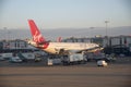 Passenger jet on the terminal stand at LHR