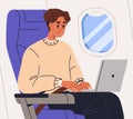 Passenger with laptop, sitting in airplane chair. Tourist with computer on knees during air flight, business travel