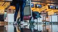 The passenger and luggage cart in front of check-in counter desk