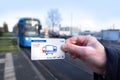 passenger, male hand hold electronic ticket, travel eTicket passes for public transport, Stadtbahn train, typical German Public