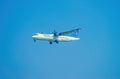 Passenger plane bearing number VN-B225 ATR 72 of Vasco Vietnam Air landing at Tan Son Nhat International Airport, Ho Chi Minh City Royalty Free Stock Photo