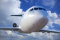passenger plane in the blue sky Royalty Free Stock Photo