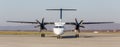 Passenger plane Bombardier Q400 of Aurora Airlines on runway, front view. Turboprop engine. Aviation and transportation Royalty Free Stock Photo