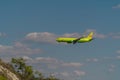 A passenger plane comes in to land from the Black sea at the airport in Gelendzhik Royalty Free Stock Photo