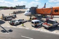 Passenger plane maintenance in airport before flight, ground operations at Berlin Airport