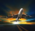 Passenger plane take off from runways against beautiful dusky sk Royalty Free Stock Photo