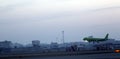 Passenger plane takes off from the airport runway. Side-view of aircraft Royalty Free Stock Photo