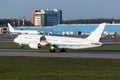 Passenger plane takes off from the airport runway Royalty Free Stock Photo