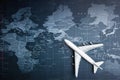 Passenger plane on the world map.Business transportation system Royalty Free Stock Photo