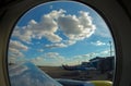 Passenger planes at the airport, view through window Royalty Free Stock Photo