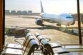 Passenger planes at the airport, view through window Royalty Free Stock Photo