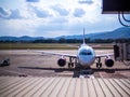 Passenger planes at the airport, view through window Royalty Free Stock Photo