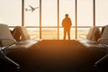 Passenger seat in departure lounge for see airplane, View from airport terminal.Transport travel conceptt Royalty Free Stock Photo