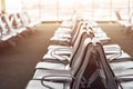 Passenger seat in Departure lounge for see Airplane, Waiting hall, view from airport terminal. Transport and travel concept Royalty Free Stock Photo