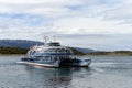 Passenger ship in the Beagle channel shore estates Harberton. Royalty Free Stock Photo