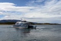 Passenger ship in the Beagle channel shore estates Harberton. Royalty Free Stock Photo