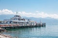 Passenger ship docked at pier in Lausanne Ouchy port, Switzerland on Lake Leman, Geneva Lake