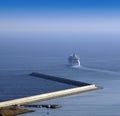 Passenger ship leaving port.