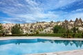 Swimming pool in Cappadocia mountain rock landscape, Turkey Royalty Free Stock Photo