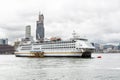 Passenger ship standing in Victoria harbour in Hong Kong. Royalty Free Stock Photo