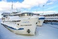 Passenger ships at the pier of a frozen ice lake in Russia