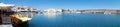 Passenger ships in the sea port harbor, restaurants and building fort on a port of Heraklion, Crete, Greece. Europe. Panorama Royalty Free Stock Photo