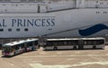 Passenger shuttle buses alongside a cruise ship berthed in Le Havre, France