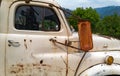 The passenger side door of a rusty antique truck Royalty Free Stock Photo